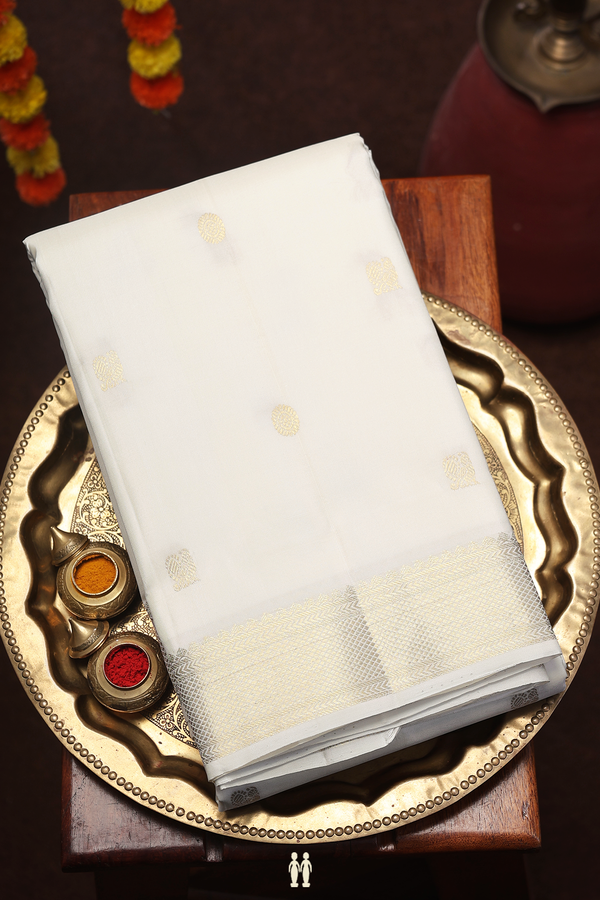 Kanchipuram Silk Saree In White With Peacock Chakram Buttas