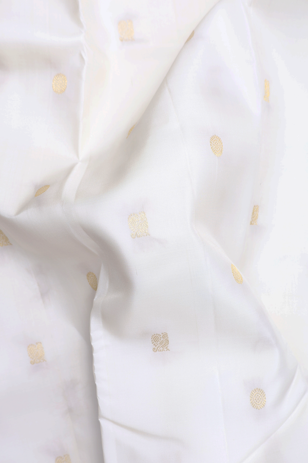 Kanchipuram Silk Saree In White With Peacock Chakram Buttas