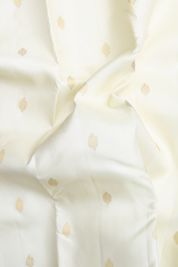 Kanchipuram Silk Saree In White With Zari Buttas