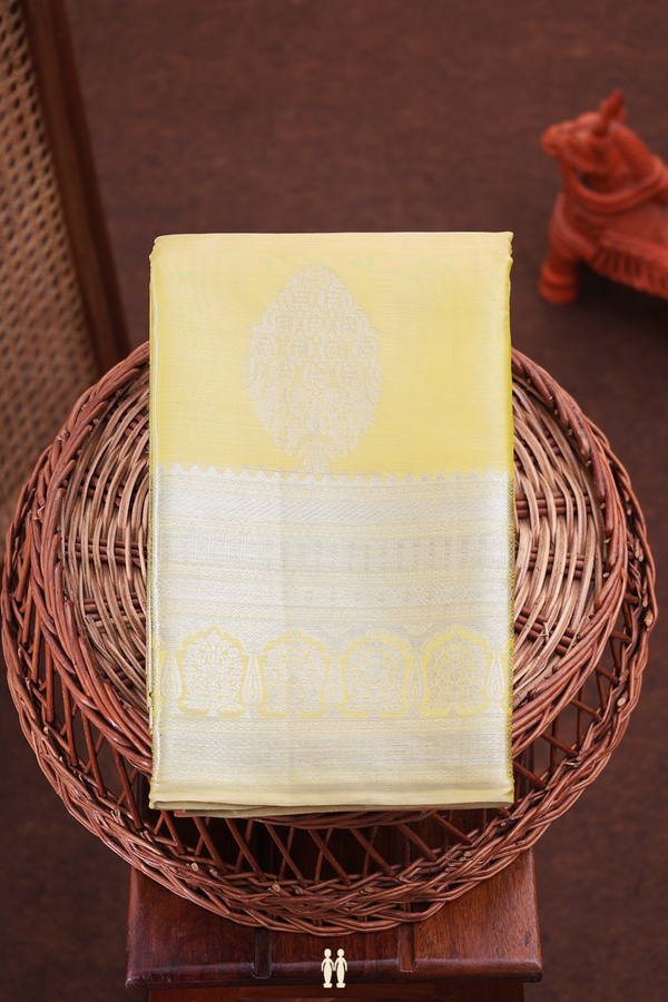 Kanchipuram Silk Saree In Yellow Tissue With Zari Motifs