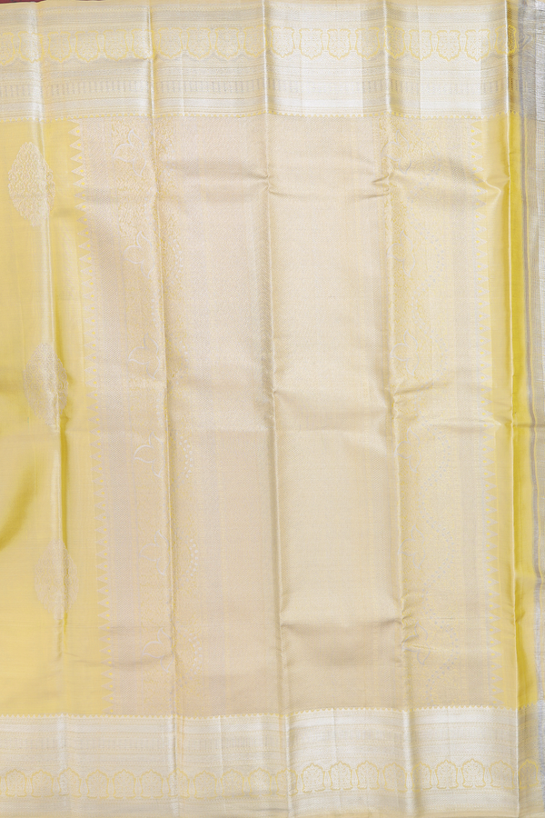 Kanchipuram Silk Saree In Yellow Tissue With Zari Motifs