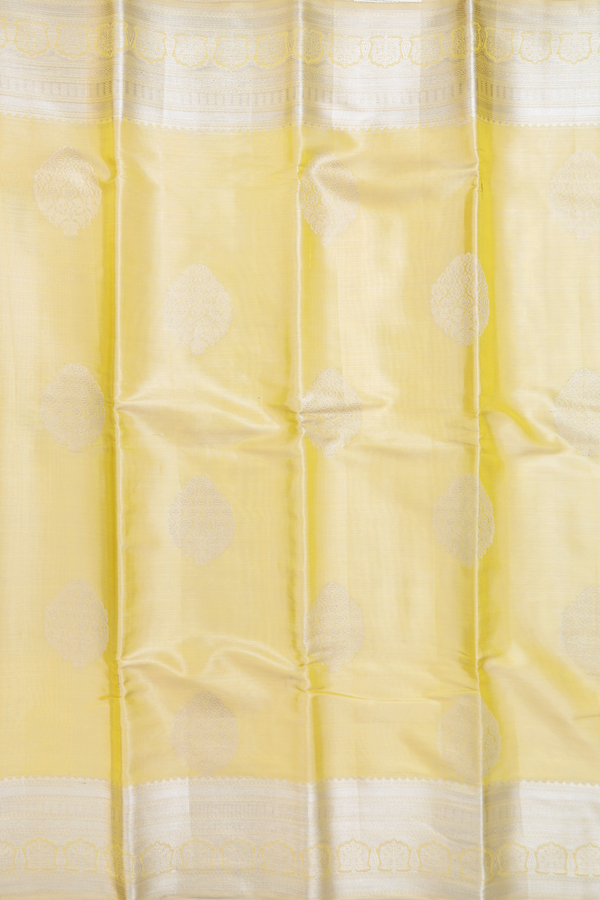 Kanchipuram Silk Saree In Yellow Tissue With Zari Motifs
