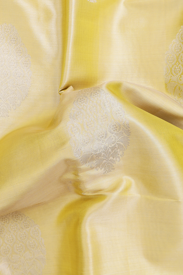 Kanchipuram Silk Saree In Yellow Tissue With Zari Motifs