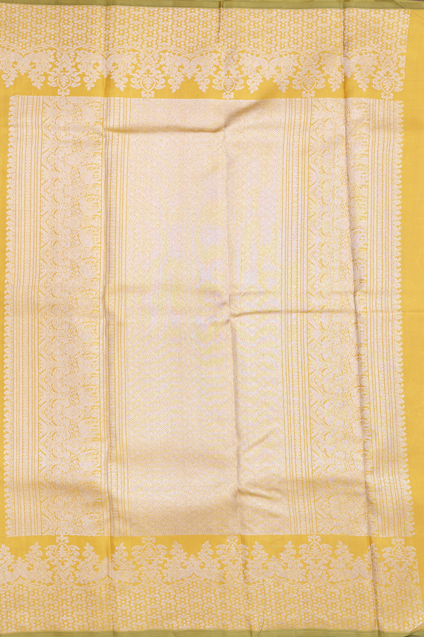 Kanchipuram Silk Saree In Yellow With Diamond Buttis