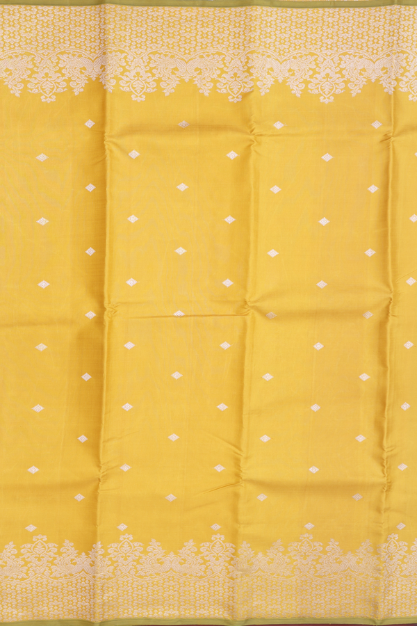 Kanchipuram Silk Saree In Yellow With Diamond Buttis