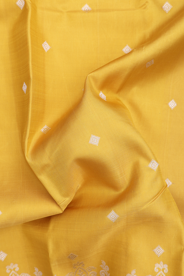 Kanchipuram Silk Saree In Yellow With Diamond Buttis