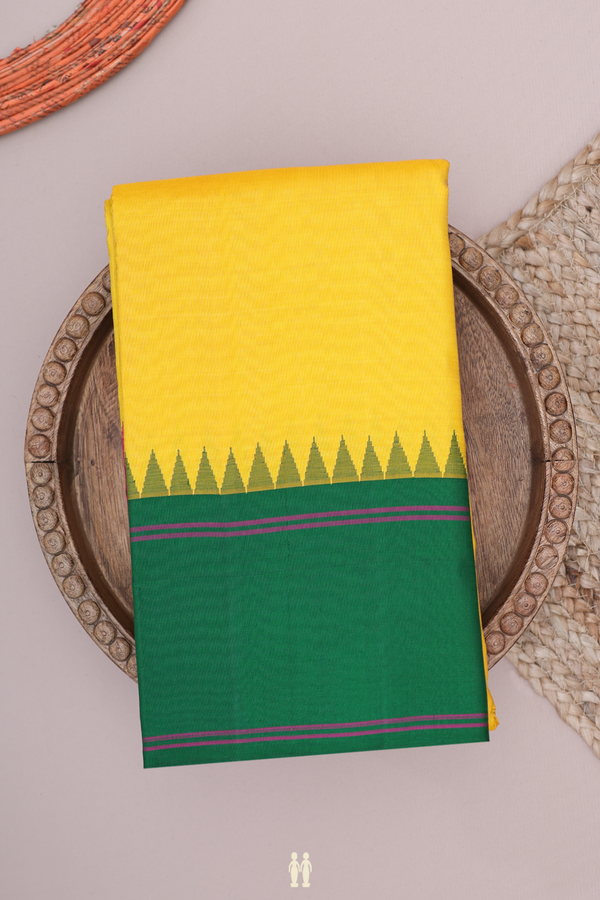 Kanchipuram Silk Saree In Yellow With Ganga Jamuna Border