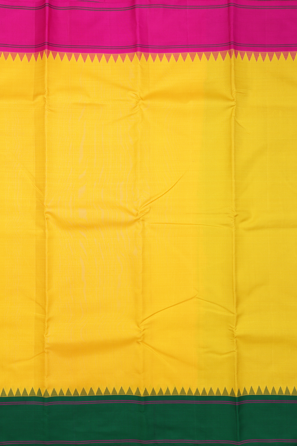 Kanchipuram Silk Saree In Yellow With Ganga Jamuna Border