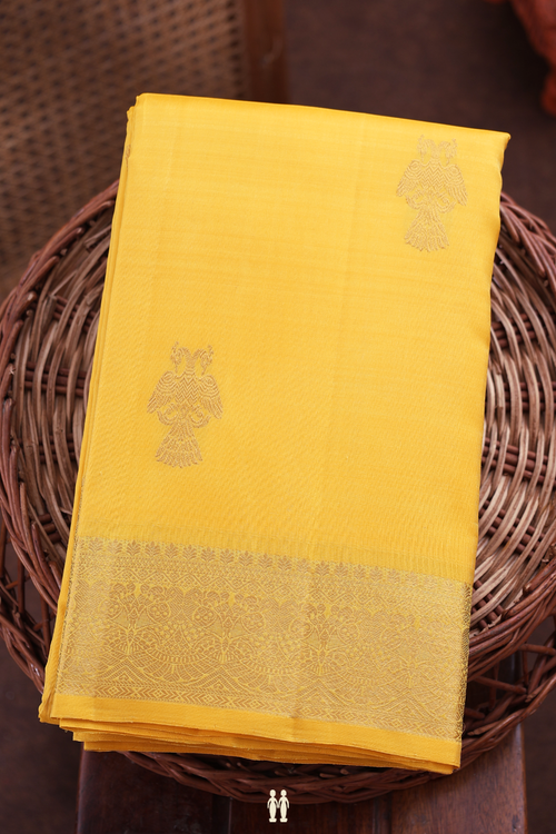 Kanchipuram Silk Saree In Yellow With Iruthalai Pakshi Buttas