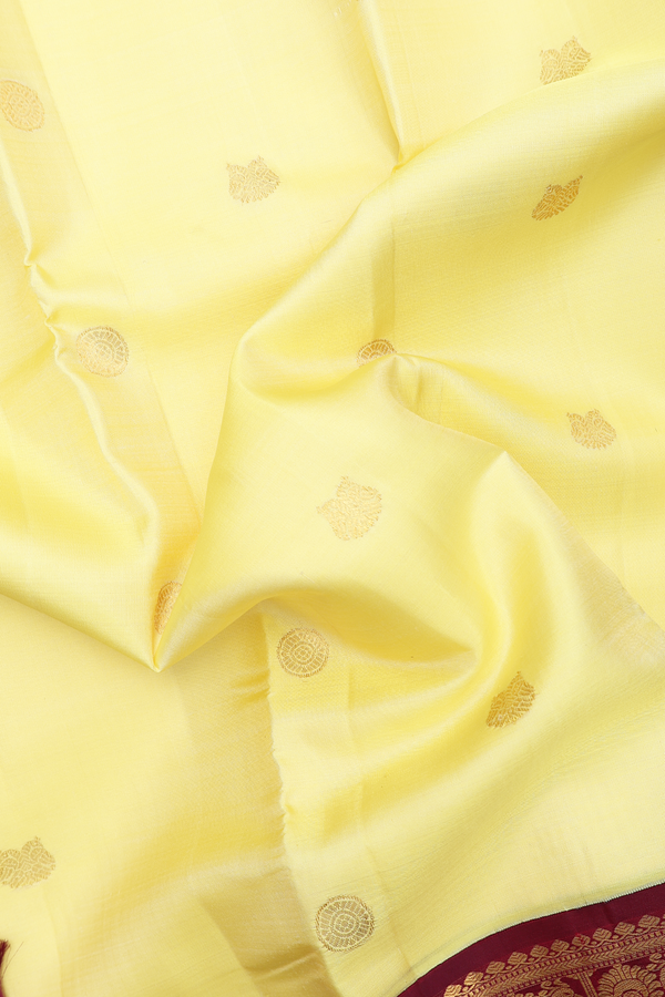 Kanchipuram Silk Saree In Yellow With Iruthalai Pakshi Buttas