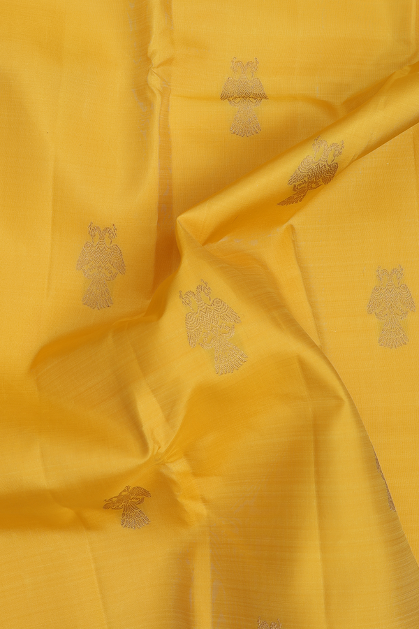 Kanchipuram Silk Saree In Yellow With Iruthalai Pakshi Buttas
