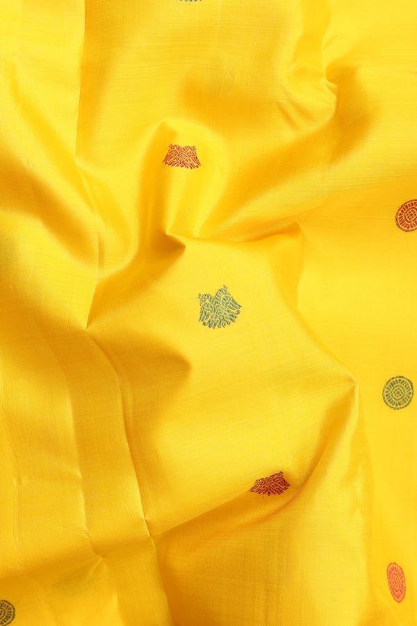Kanchipuram Silk Saree In Yellow With Iruthalai Pakshi Buttas