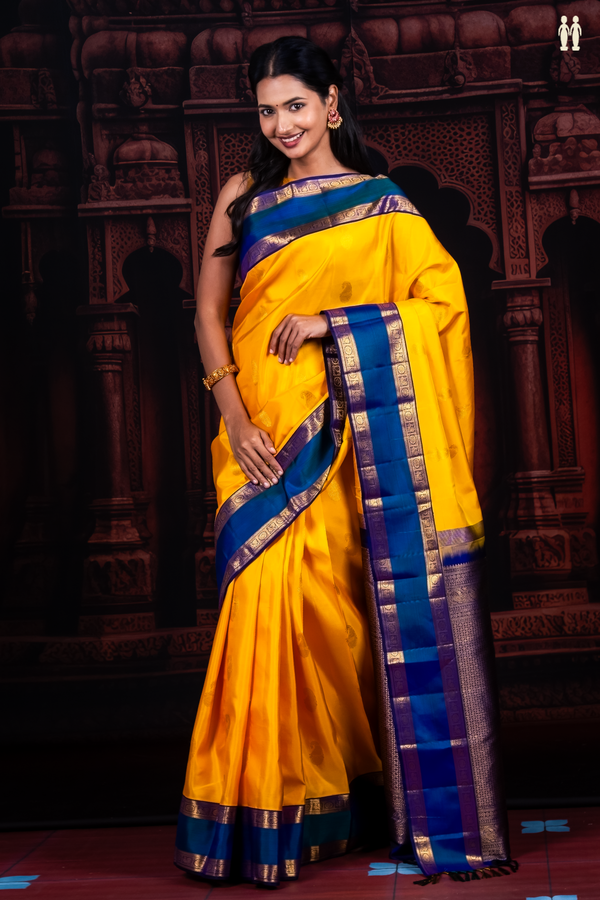 Kanchipuram Silk Saree In Yellow With Paisley Buttas