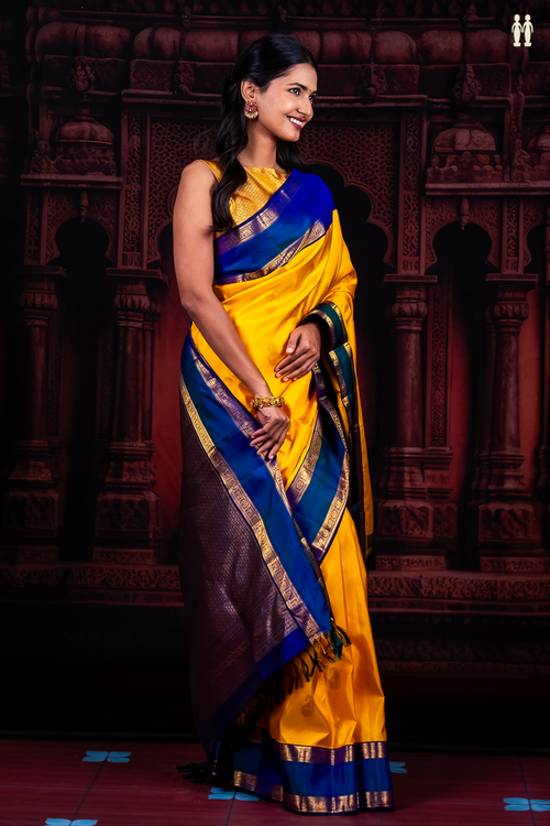 Kanchipuram Silk Saree In Yellow With Paisley Buttas