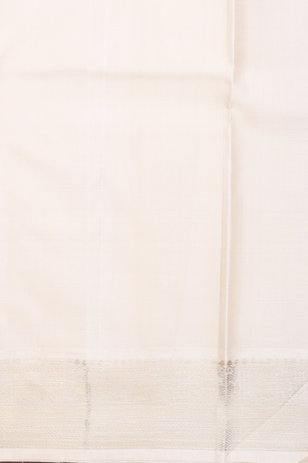 Kanchipuram Silk Saree In Yellow With Paisley Buttas