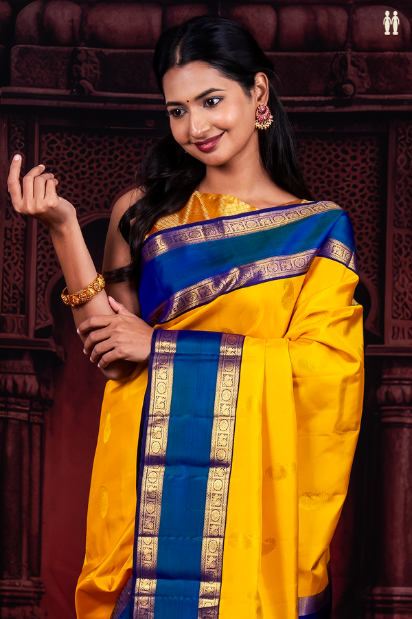 Kanchipuram Silk Saree In Yellow With Paisley Buttas