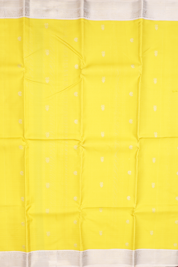 Kanchipuram Silk Saree In Yellow With Paisley Buttas