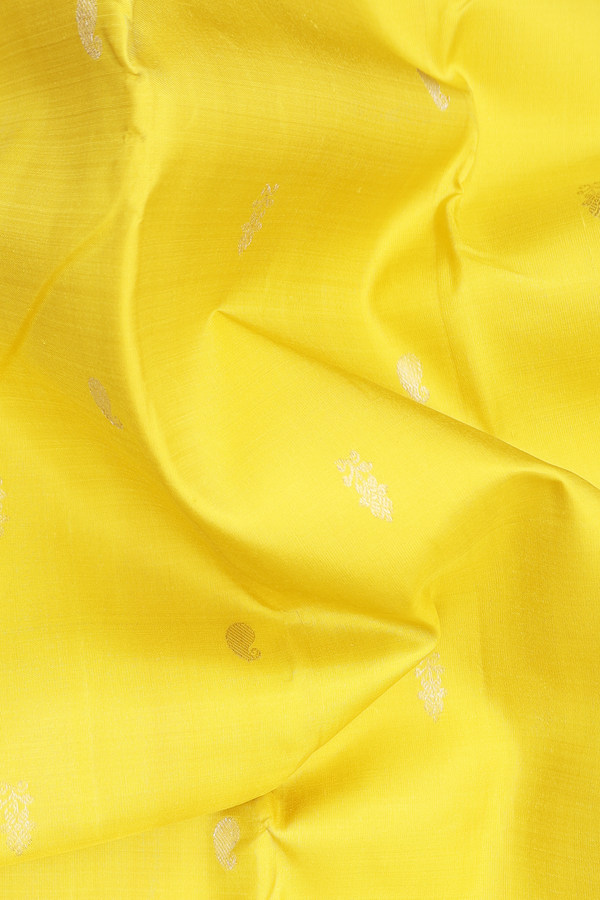 Kanchipuram Silk Saree In Yellow With Paisley Buttas