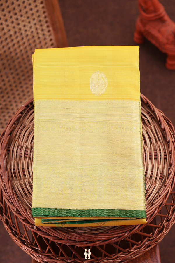 Kanchipuram Silk Saree In Yellow With Peacock Buttas