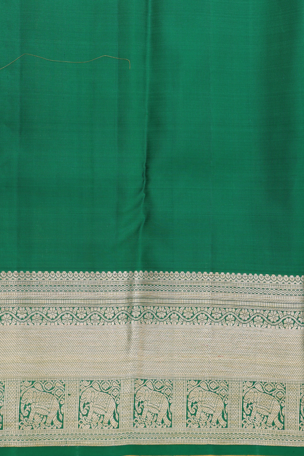 Kanchipuram Silk Saree In Yellow With Peacock Buttas