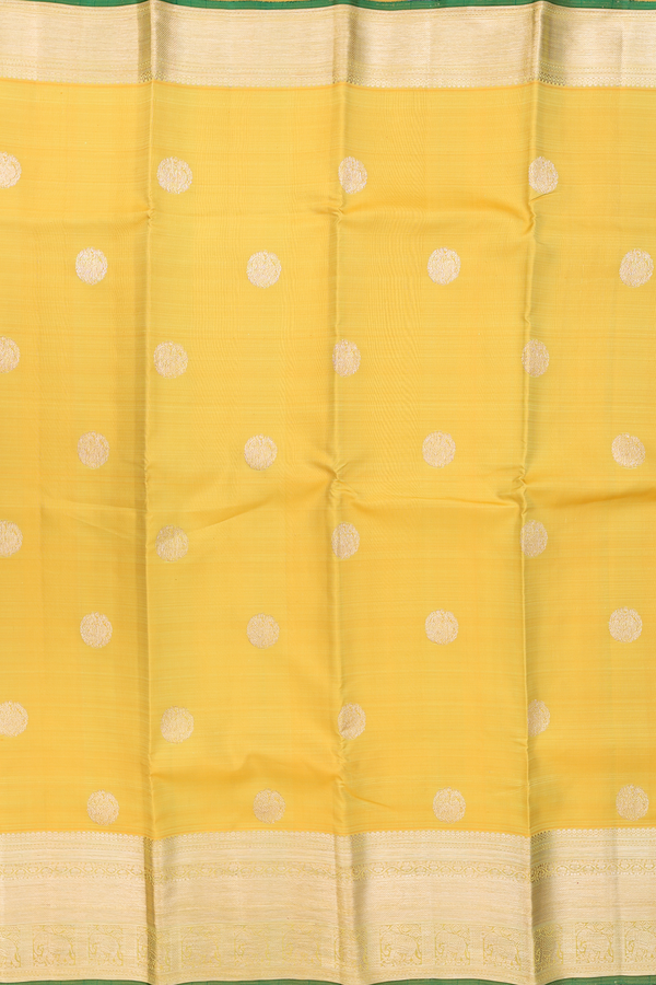 Kanchipuram Silk Saree In Yellow With Peacock Buttas