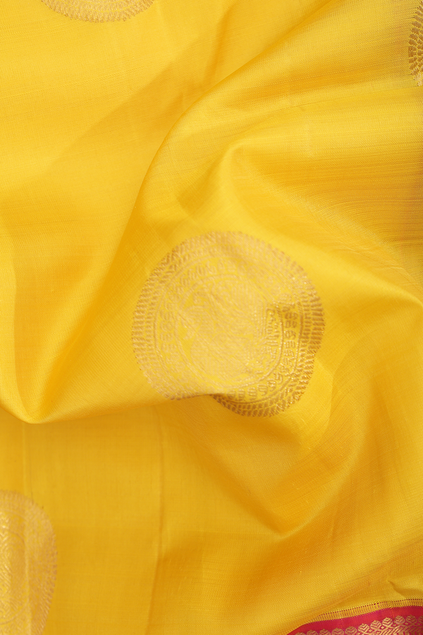 Kanchipuram Silk Saree In Yellow With Peacock Motifs
