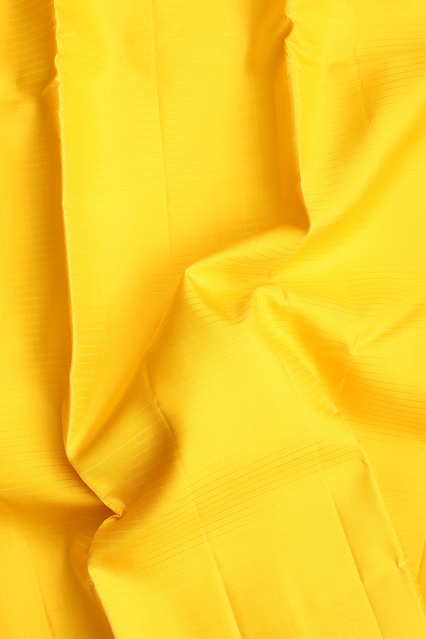 Kanchipuram Silk Saree In Yellow With Self Stripes Design