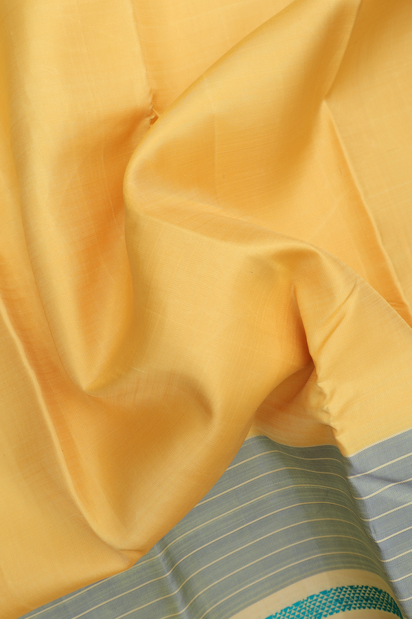 Kanchipuram Silk Saree In Yellow With Threadwork Border