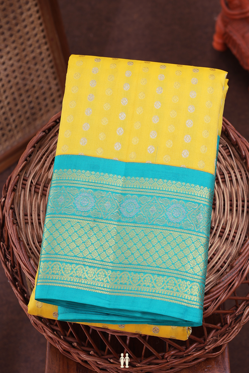 Kanchipuram Silk Saree In Yellow With Zari Buttas