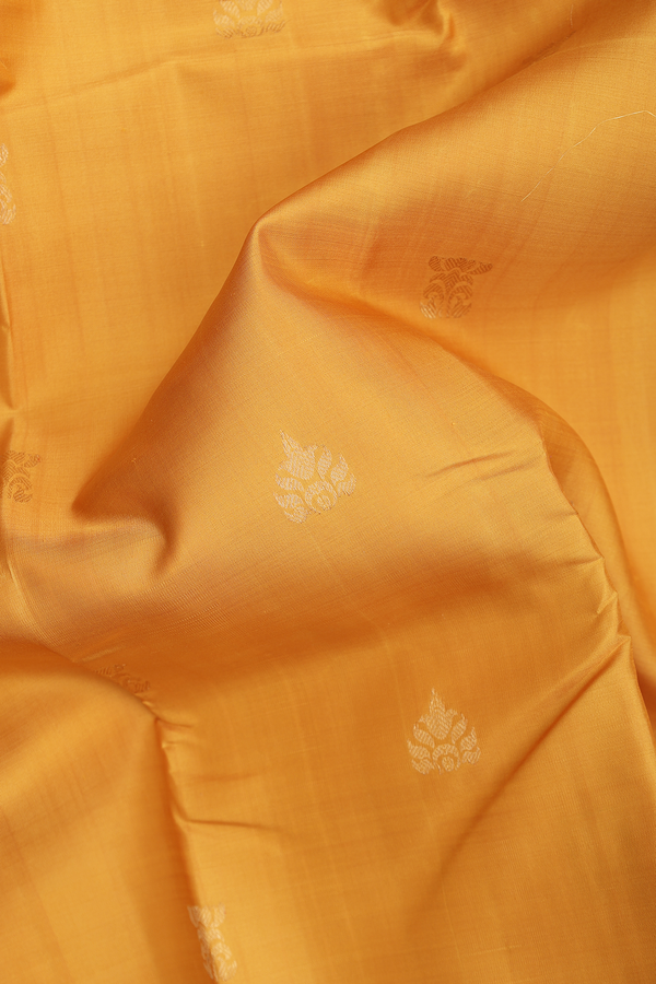 Kanchipuram Silk Saree In Yellow With Zari Buttas