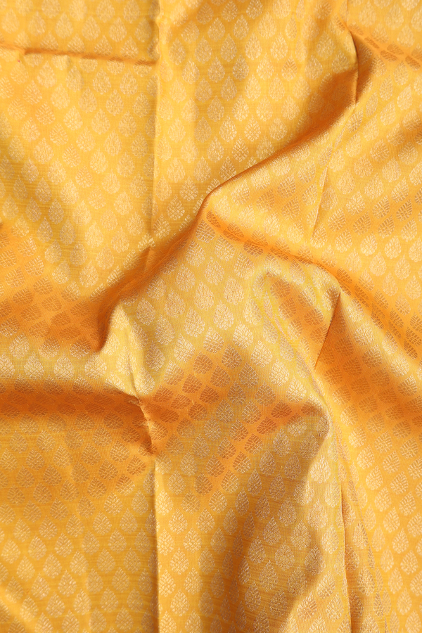 Kanchipuram Silk Saree In Yellow With Zari Buttas