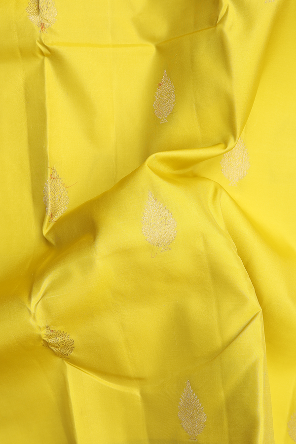 Kanchipuram Silk Saree In Yellow With Zari Buttas