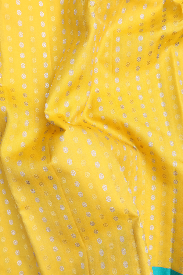 Kanchipuram Silk Saree In Yellow With Zari Buttas