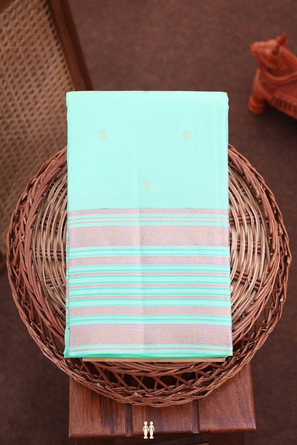 Kanchipuram Silk Saree In Pastel Sea Green With Floral Buttis