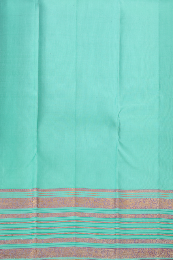 Kanchipuram Silk Saree In Pastel Sea Green With Floral Buttis