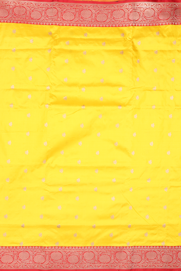 Banarasi Silk Saree In Saffron Yellow With Floral Buttas