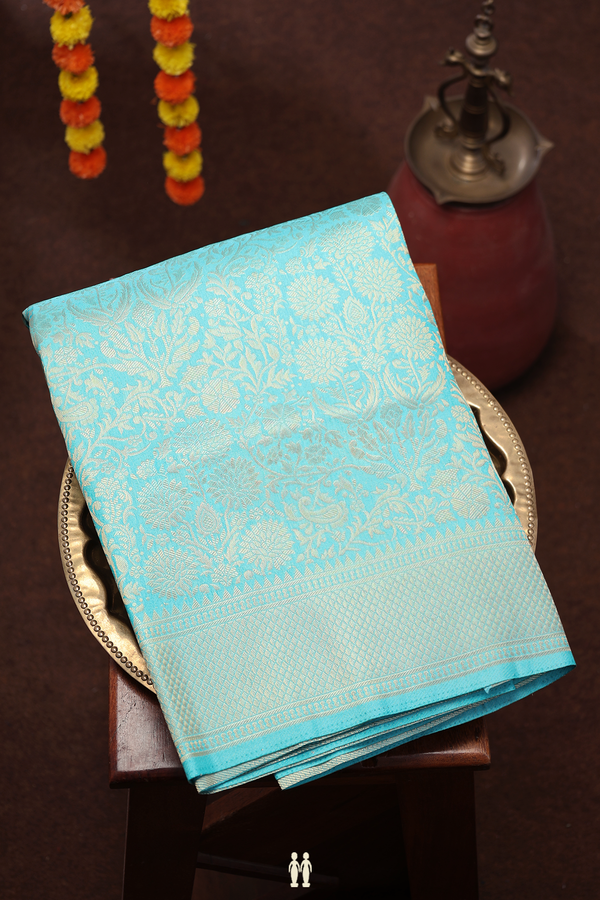 Banarasi Silk Saree In Turquoise Blue With Floral Design