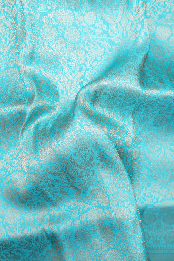 Banarasi Silk Saree In Turquoise Blue With Floral Design