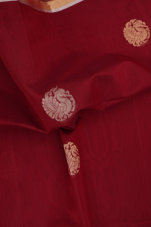 Kora Silk Cotton Saree In Burgundy Red With Peacock Motifs
