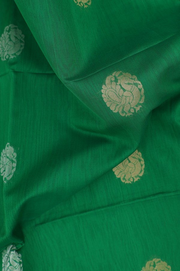 Kora Silk Cotton Saree In Green With Peacock Motifs
