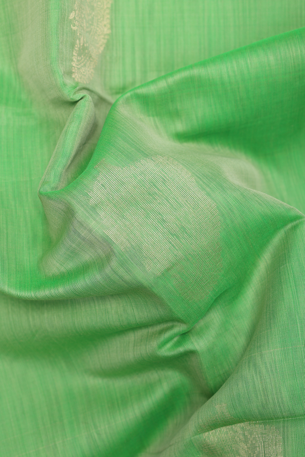 Kora Silk Cotton Saree In Green With Zari Motifs