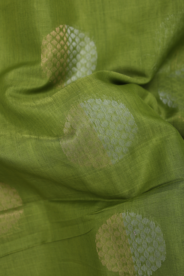 Kora Silk Cotton Saree In Green With Zari Motifs