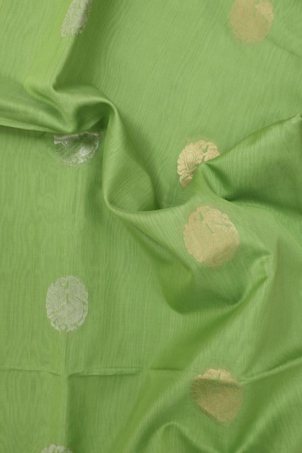 Kora Silk Cotton Saree In Pastel Green With Peacock Motifs