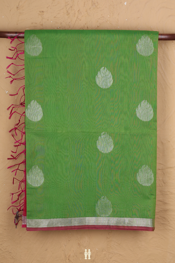 Kora Silk Cotton Saree In Parrot Green With Floral Buttas