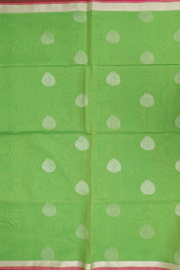 Kora Silk Cotton Saree In Parrot Green With Floral Buttas