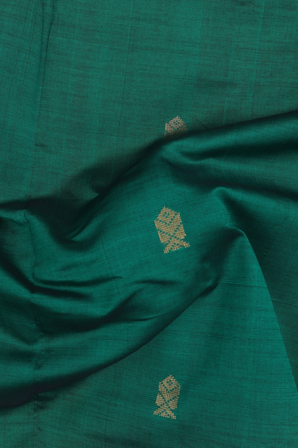 Semi Silk Cotton Saree In Green With Zari Buttas