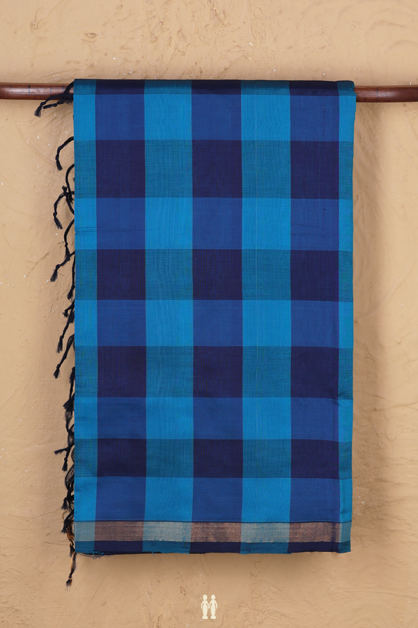 Semi Silk Cotton Saree In Shades Of Blue With Checks Design