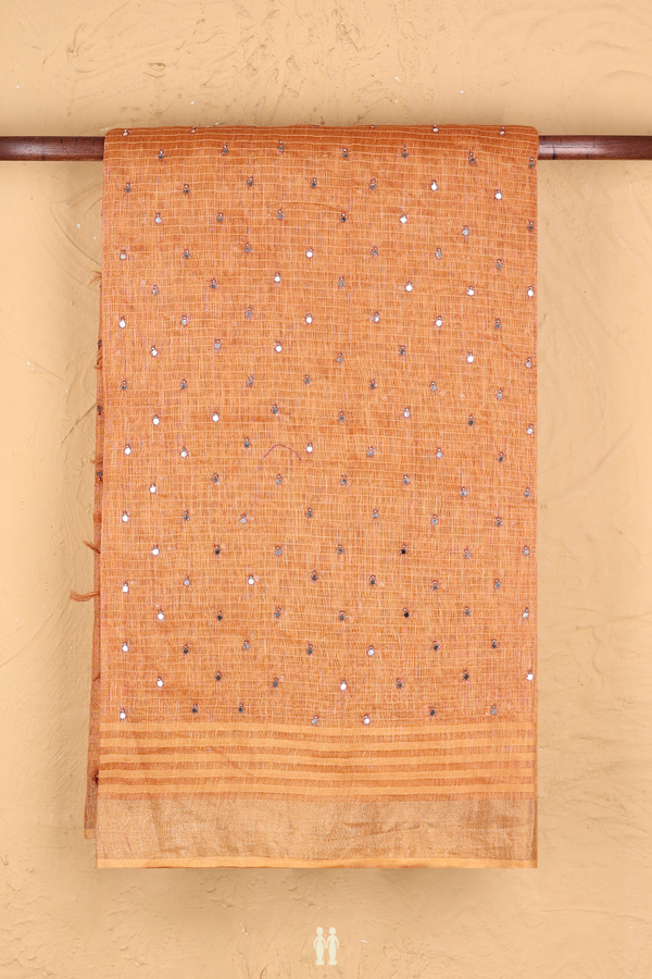 Linen Saree In Ginger Orange With Mirror Work Buttis