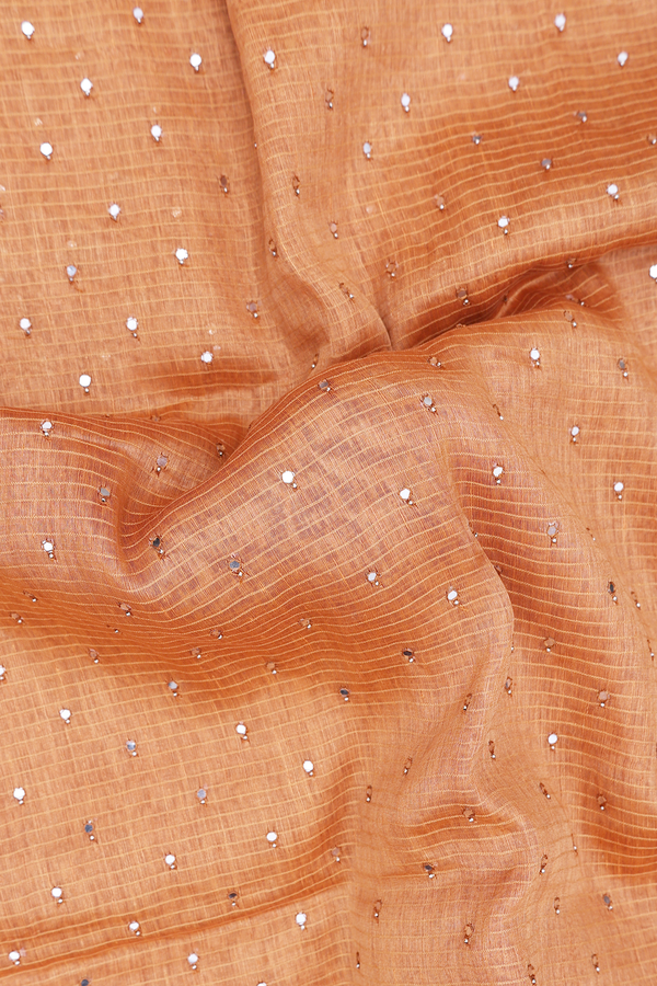 Linen Saree In Ginger Orange With Mirror Work Buttis