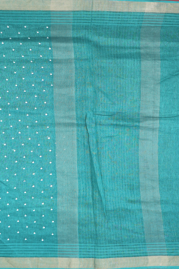 Linen Saree In Green With Mirror Work Buttis